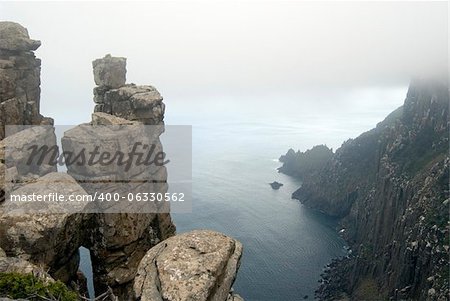 Precarious stacks of dolerite form the rugged cliffs of Cape Pillar, Tasmania