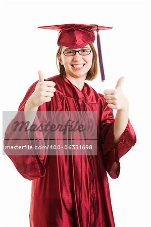 Female high school or college graduate giving thumbs up sign.  Isolated on white.