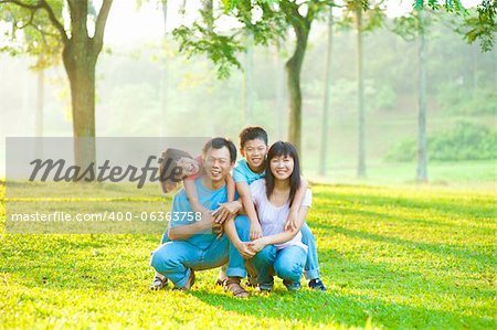 Asian family portrait at outdoor park