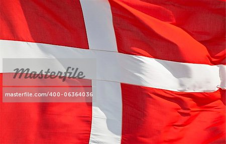 National flag of denmark flying in the wind