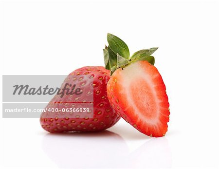 Strawberries closeup over white background