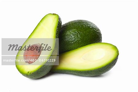 Fresh avocado fruit isolated over white background