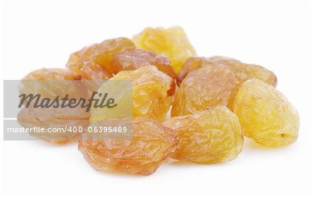 Heap of yellow raisin isolated on white background