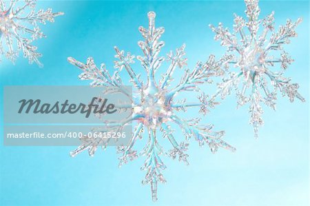 Snowflake shape, photo on the blue background
