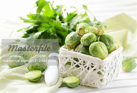 fresh raw brussels sprouts on a wooden table