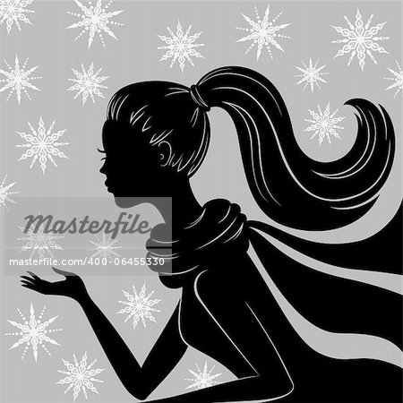 Silhouette of young woman on the flying snowflakes background