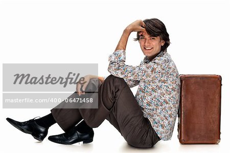 portrait of man with a suitcase on a white background