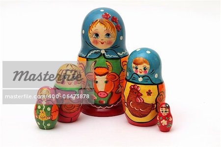 colored matryoshka dolls isolated on white background