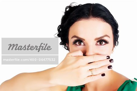 Young beautiful woman covering her mouth with her hand