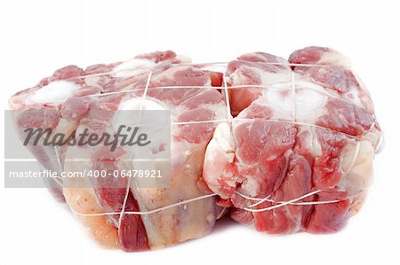 Ox tail of beef in front of white background