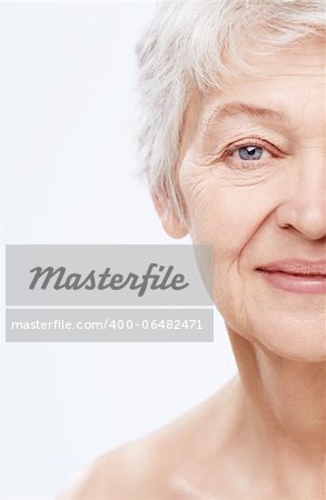 Elderly woman on a white background