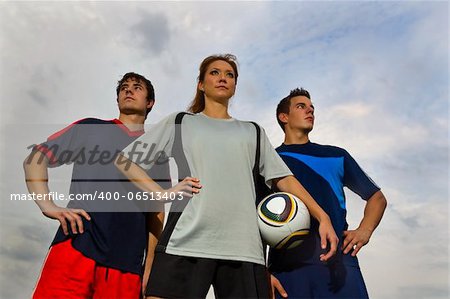 Image of male and female soccer players before a soccer game