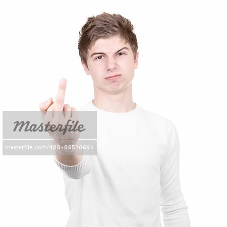 Angry teenager shows rude gesture on a white background