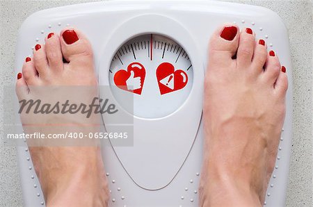 Female feet on bathroom scale with concept symbols for health care