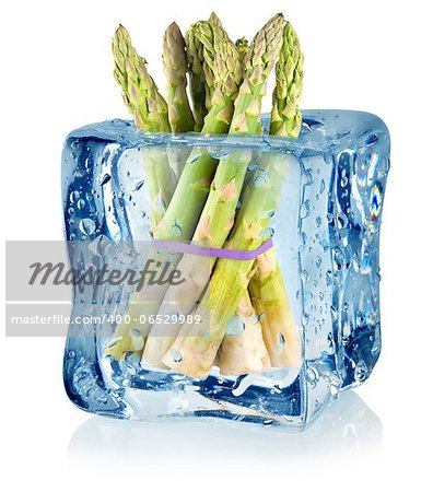 Ice cube and asparagus isolated on a white background