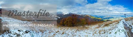 October Carpathian mountain plateau with first winter snow and cable ski lift