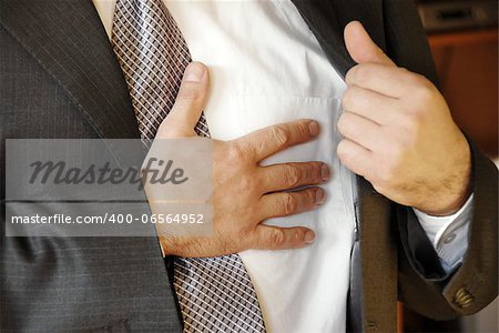 businessman  hand on chest, stressful job troubles