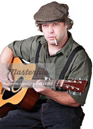 Serious guitarist with cigarette over white background