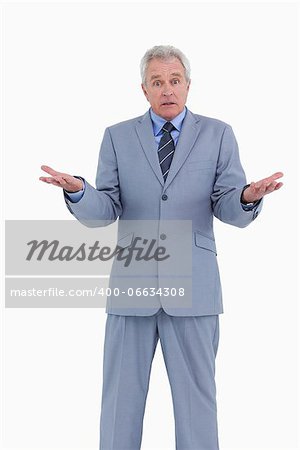 Irritated mature tradesman against a white background