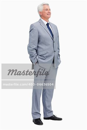 Smiling man in a suit against white babckground