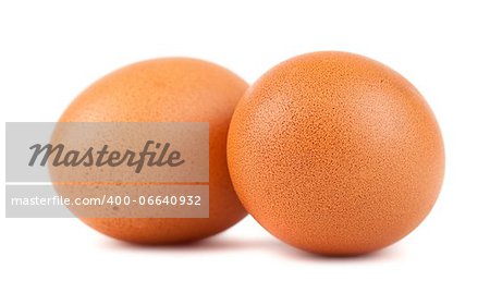 Pair of brown chicken eggs isolated on white background