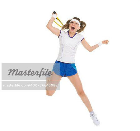 Fierce tennis player jump to hit ball