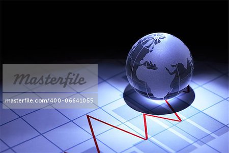 Business concept. Glass globe on paper background with chart