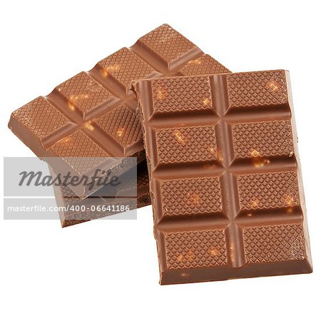 Milk chocolate with nuts isolated on white background