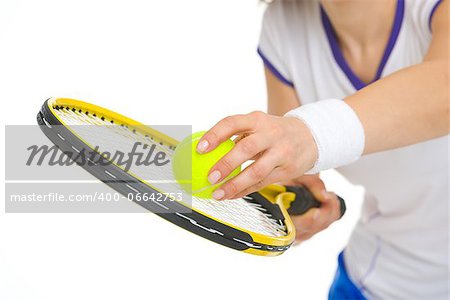 Closeup on tennis player ready to serve ball