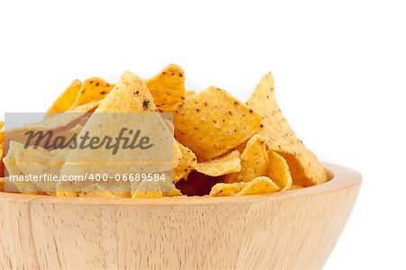 Bowl full of crisps against white background