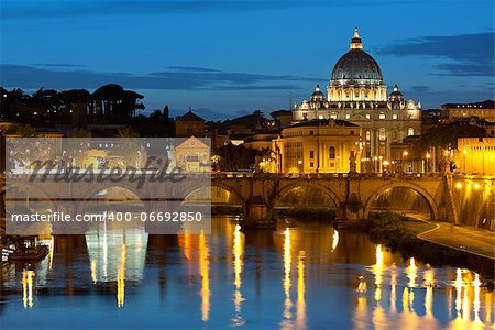 Classical view on Vatican over the Tiber river at night.