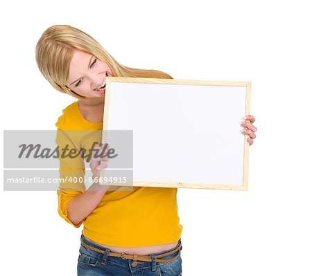 Angry student girl biting blank board