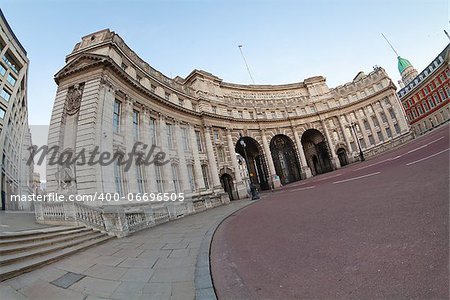 Admiralty Arch in London, England, United Kingdom. Shot taken fisheye wide angle lens, which highlights the curvilinear architectural forms and round the square in front