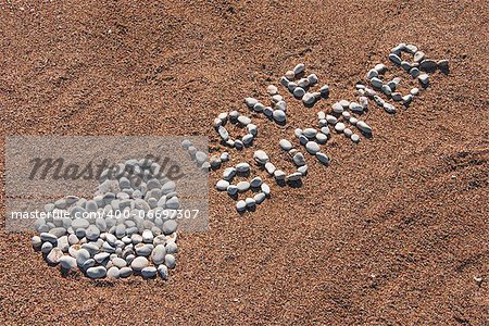 Summer picture from pebble and sand on a beach