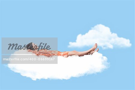 Beautiful girl, sleeping on a white cloud