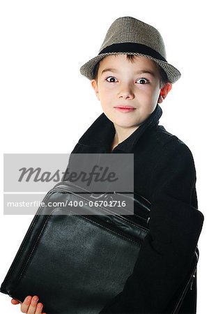 Young boy wearing a hat with case on white background