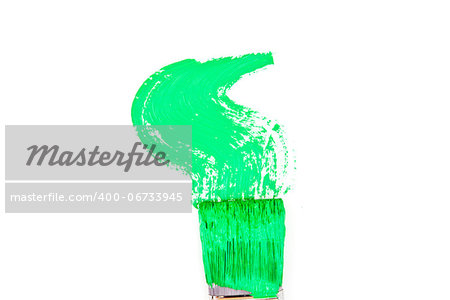 Green brush stroke forming a zigzag against a white background