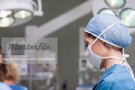 Nurse wearing a mask in operating theatre