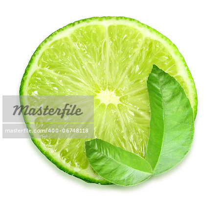 One slice of fresh lime and green leaf. Placed on white background. Close-up. Studio photography.