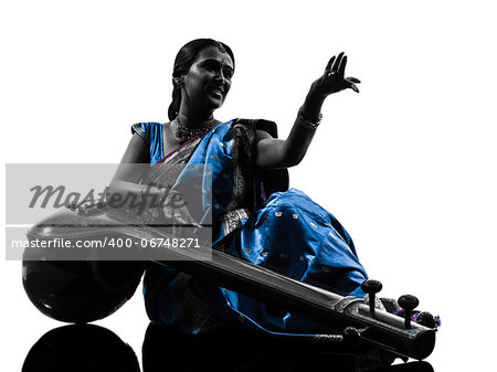 one indian tempura musician woman in silhouette studio isolated on white background