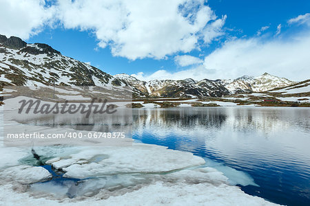 Spring alps mountain lake Lago della Piazza (Switzerland, Passo del San Gottardo)