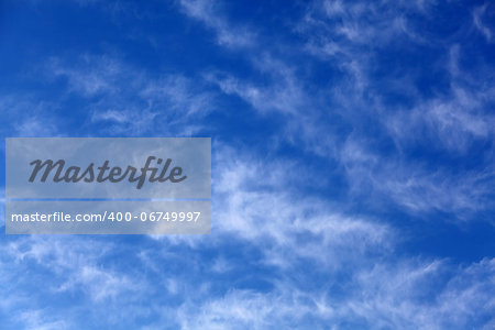 Blue sky with some white cirrus clouds