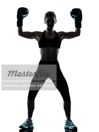 one caucasian woman exercising boxe fitness workout posture in silhouette studio isolated on white background