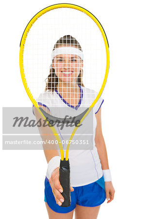 Happy female tennis player holding racket in front of face