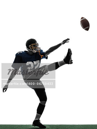 one caucasian american football player man kicker kicking in silhouette studio isolated on white background