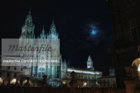 the moonlight illuminates the facade of the cathedral of Santiago de Compostela