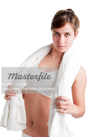 Woman resting with a towel around her neck after a fitness workout, isolated in white
