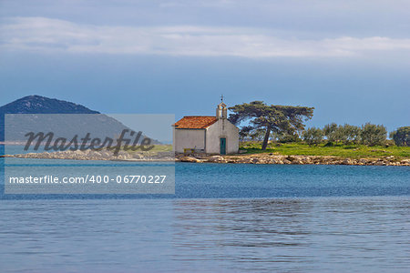 Church on small island coast, Pakostane, Dalmatia, Croatia