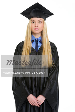 Portrait of young woman in graduation gown