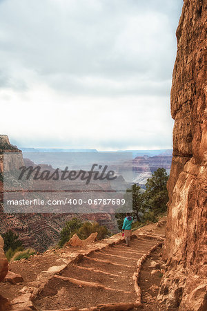 young girl on Kaibab trail into Grand Canyon